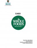 ¿Cuáles son los elementos centrales de la estrategia de Whole Foods?